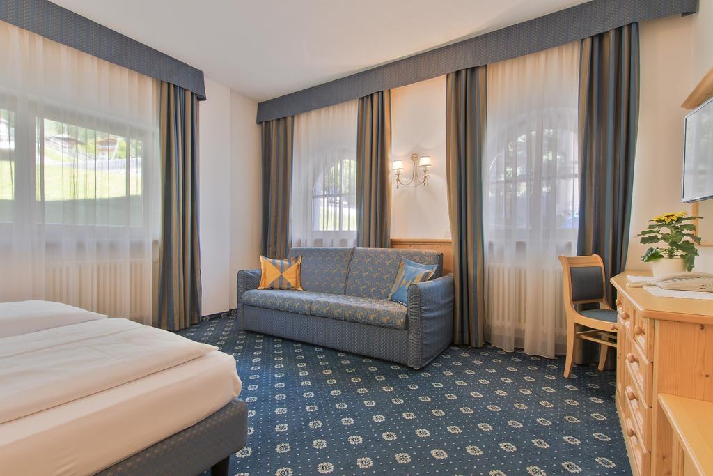 Garni La Dorada Aparthotel Colfosco Kamer foto